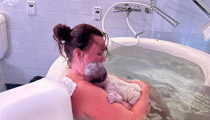 mum with newborn baby after water birth