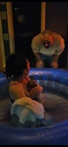 mum holding newborn baby after birth