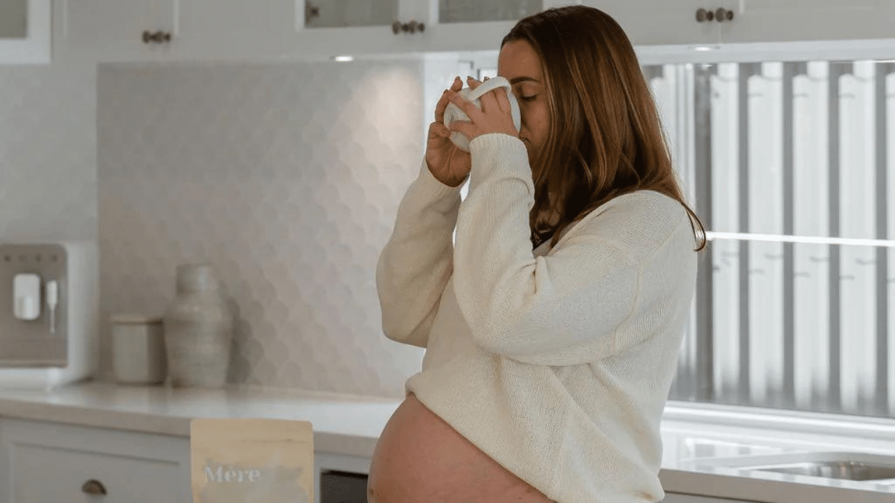 Woman drinking Raspberry Tea Leaf